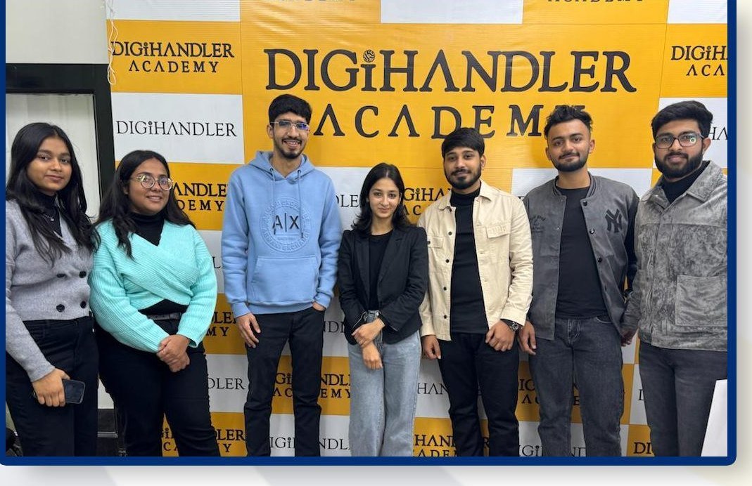 A student batch in front of the Digihandler Academy backdrop