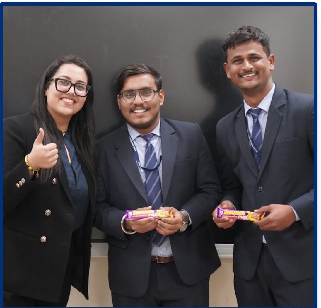 Trainers and a student celebrating course completion