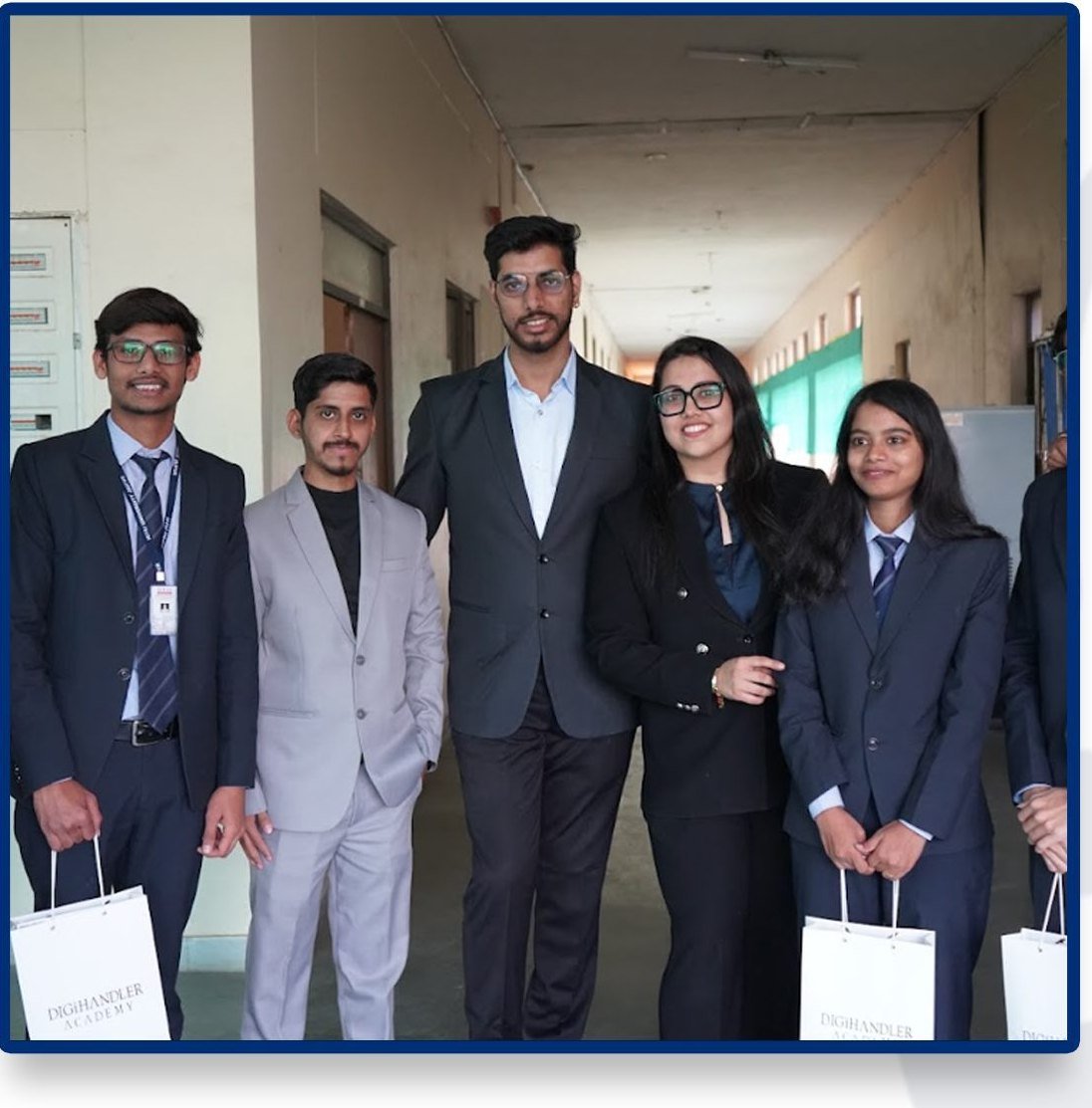 A student group photo in the campus corridor